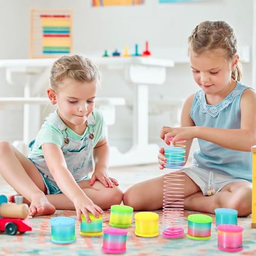 ALMEKAQUZ 8 Pack Glow Coil Spring Toy – Mini Springs Rainbow Magic Fidget Toys for Kids Boys Girls – Glow in the Dark Party Favors, Projection Star Night Light Toy, Pinata Fillers for Tod